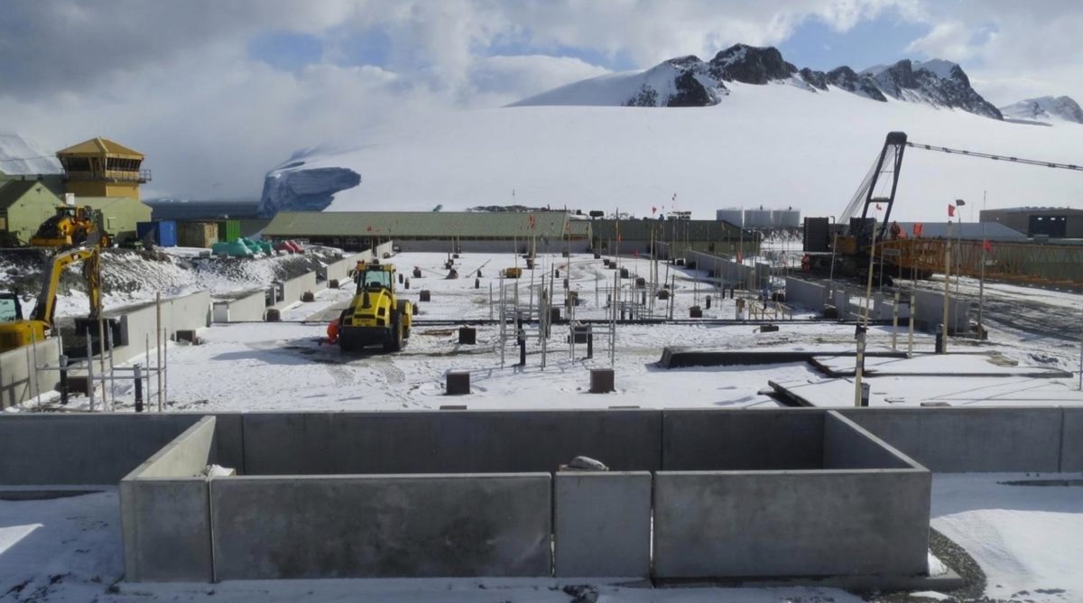The Discovery Building site at Rothera Research Station marked out with flags and scaffolding. Credit: Chris Lloyd