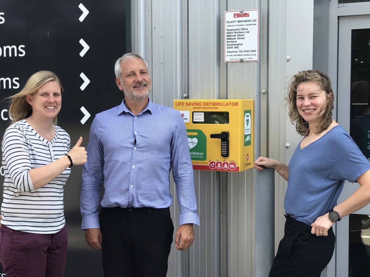 Elliotts Living Spaces staff in Lymington with their 24-hour access defibrillator