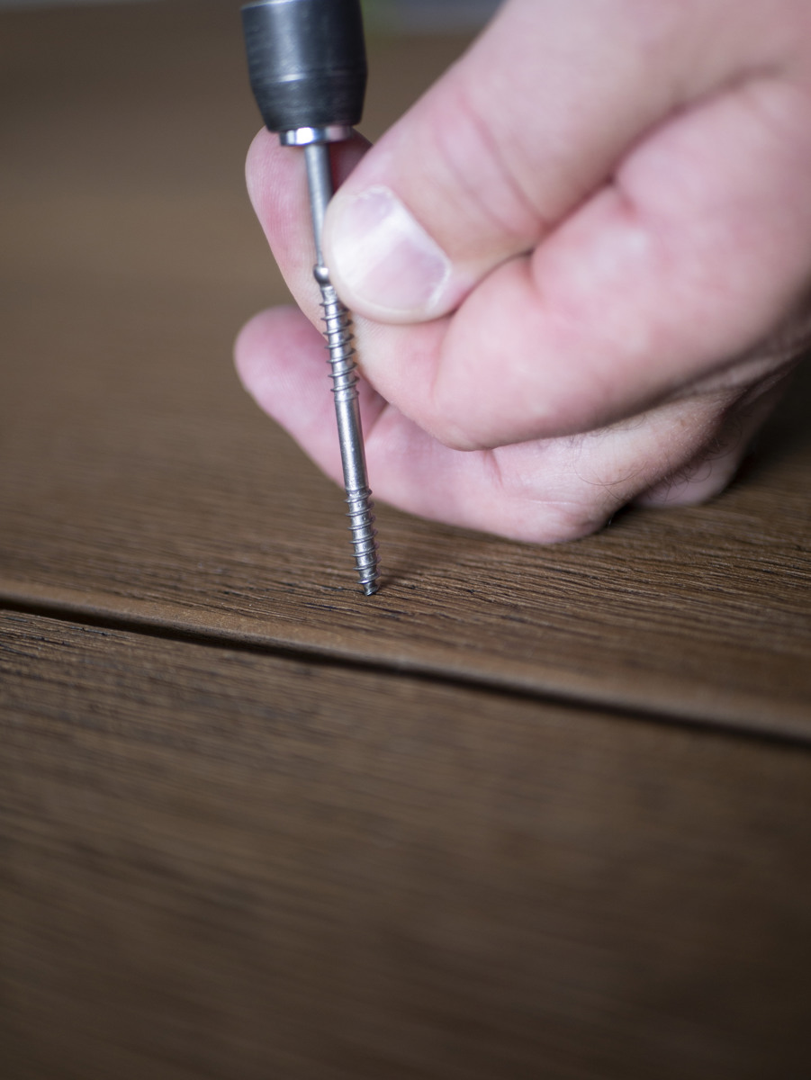 Millboard Durafix screw going into a Millboard plank